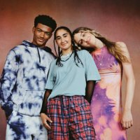 non-binary person with male and female friends - hairstyle stock pictures, royalty-free photos & images
