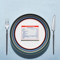 nutrition label on plate in table setting - junk food stock pictures, royalty-free photos & images