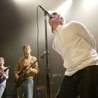 Oasis guitarist Gem Archer, bassist Andy Bell and singer Liam Gallagher perform at The Joint inside the Hard Rock Hotel & Casino April 26, 2002 in...