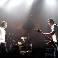 Oasis singer Liam Gallagher and his brother, guitarist Noel Gallagher, perform at The Joint inside the Hard Rock Hotel & Casino April 26, 2002 in Las...