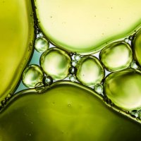 oil & water - abstract background green macro - food stock pictures, royalty-free photos & images