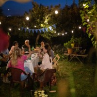 old friends having fun time on birthday party at backyard - garden decoration stock pictures, royalty-free photos & images