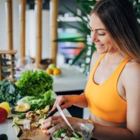 one fit woman making healthy vegetable salad for breakfast - food stock pictures, royalty-free photos & images