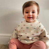one year old girl in wool sweater - fashion stock pictures, royalty-free photos & images