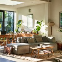 open plan living space in residential house with natural light and retro furniture - home decoration stock pictures, royalty-free photos & images