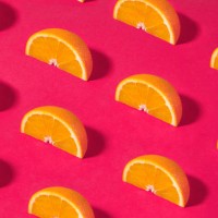 orange fruit pattern on pink background - food stock pictures, royalty-free photos & images