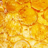 orange slices under water - food stockfoto's en -beelden