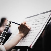 orchestra rehearsing at concert hall - concert stock pictures, royalty-free photos & images