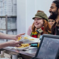 ordering fish and chips - junk food stock pictures, royalty-free photos & images