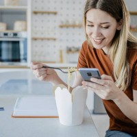 ordering food delivery and e-commerce - junk food stock pictures, royalty-free photos & images