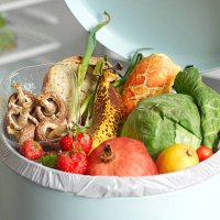 out of date rotting food in dustbin - food stock pictures, royalty-free photos & images