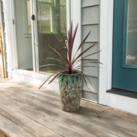 outdoor planter with potted plant on patio deck - garden decoration stock pictures, royalty-free photos & images