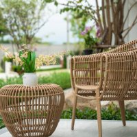 outdoor rattan furniture in garden setting - garden decoration stock pictures, royalty-free photos & images