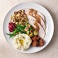 overhead of turkey meal on plate - food stock pictures, royalty-free photos & images
