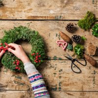overhead view of christmas wreaths being made. - home decoration stock pictures, royalty-free photos & images