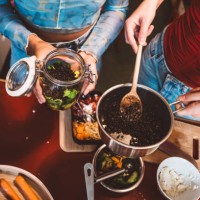 overhead view on female hands filling lentils in mason jar for take away - junk food stock pictures, royalty-free photos & images