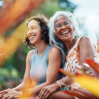 pacific islander woman and eurasian adult daughter spending time together outdoors - travel stock pictures, royalty-free photos & images