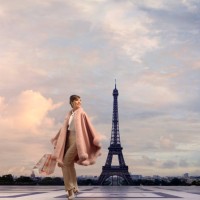 pacific islander woman walking near eiffel tower, paris, ile - fashion stock pictures, royalty-free photos & images