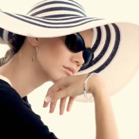 pacific islander woman wearing sunhat - fashion stock pictures, royalty-free photos & images