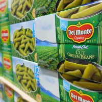 Packages of Del Monte canned green beans are stacked at a Costco Wholesale store on April 4, 2025 in San Diego, California.
