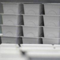 Packaging made from recycled papaer cups using the COLOURFORM process is displayed at James Cropper recycling plant on April 17, 2018 in Kendal,...