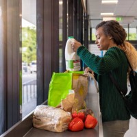 packing groceries in a supermarket - food stock pictures, royalty-free photos & images