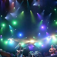 Page McConnell, Trey Anastasio, Jonathan Fishman, and Mike Gordon of Phish in concert.