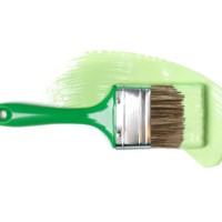 paintbrush and smooth smear of green pigment isolated on white background. concept of home repair. flat lay style and close-up - home decoration stock pictures, royalty-free photos & images