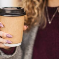 paper cup in hand - junk food stock pictures, royalty-free photos & images