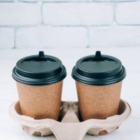 paper cup with coffee. close-up of a disposable cup. - junk food stock pictures, royalty-free photos & images