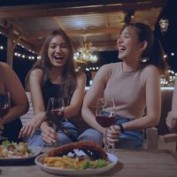 party with best friends. group of cheerful young people enjoying at luxury bar with snacks and drinks. happy female friends celebrating holiday event party at nightclub in the city - concert stock pictures, royalty-free phot