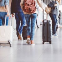 passengers walking in the airport terminal - travel stock pictures, royalty-free photos & images