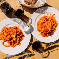 pasta amatriciana served in italian restaurant in rome, italy - food stock pictures, royalty-free photos & images