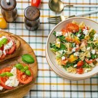 pasta salad, bruschetta tomato mozzarella - food fotografías e imágenes de stock
