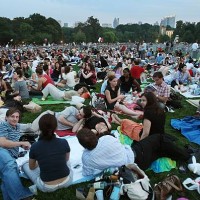 Patrons sit before a free concert in Central Park by the New York Philharmonic July 17, 2007 in New York City. The Philharmonic annually performs a...