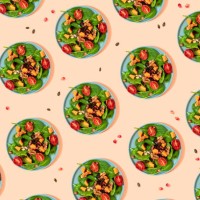 pattern of plates of fresh ready-to-eat vegan salad - food stock illustrations