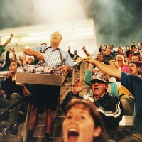 peanut vendor selling in stadium, man holding out money - food stock pictures, royalty-free photos & images