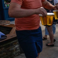 People are seen buying takeaway pints at a pub on Wandsworth Common on May 28 2020 in London, England. The prime minister announced the general...