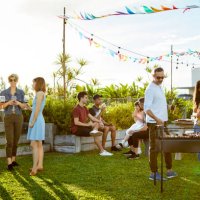 people enjoying asado party at backyard - garden decoration stock pictures, royalty-free photos & images