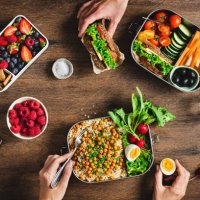 people having balanced diet from lunch boxes - food stock pictures, royalty-free photos & images