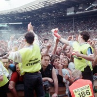 People in the audience at the Nelson Mandela 70th Birthday Tribute concert. Wembley Stadium, London, 11th June 1988.
