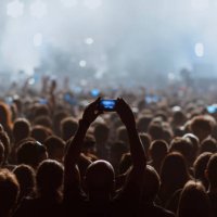 people recording a rock concert with their cell phones - concert stock pictures, royalty-free photos & images