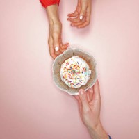 people sharing donut - food stock pictures, royalty-free photos & images