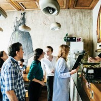 people waiting in line in busy burger restaurant - food stock pictures, royalty-free photos & images