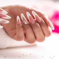 perfectly prepared gel nails decorated with diamonds. - nails art stock pictures, royalty-free photos & images