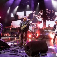 Perry Bamonte, Reeves Gabrels, Robert Smith, Jason Cooper, Simon Gallup and Roger O'Donnell of The Cure performs at Pine Knob Music Theatre on June...