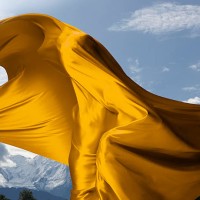 person covered in yellow material with mountains - fashion stock pictures, royalty-free photos & images