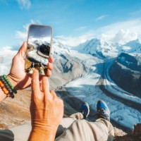 personal perspective of person photographing gorner glacier with smartphone, switzerland - travel stock pictures, royalty-free photos & images