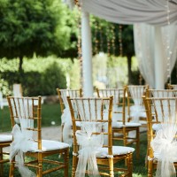 photo of beautiful backyard wedding act chair decorations. - garden decoration stock pictures, royalty-free photos & images
