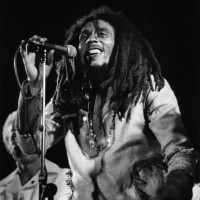 Photo of WAILERS and Bob MARLEY; Bob Marley performing live on stage at the One Love Peace concert at the National Stadium, Kingston